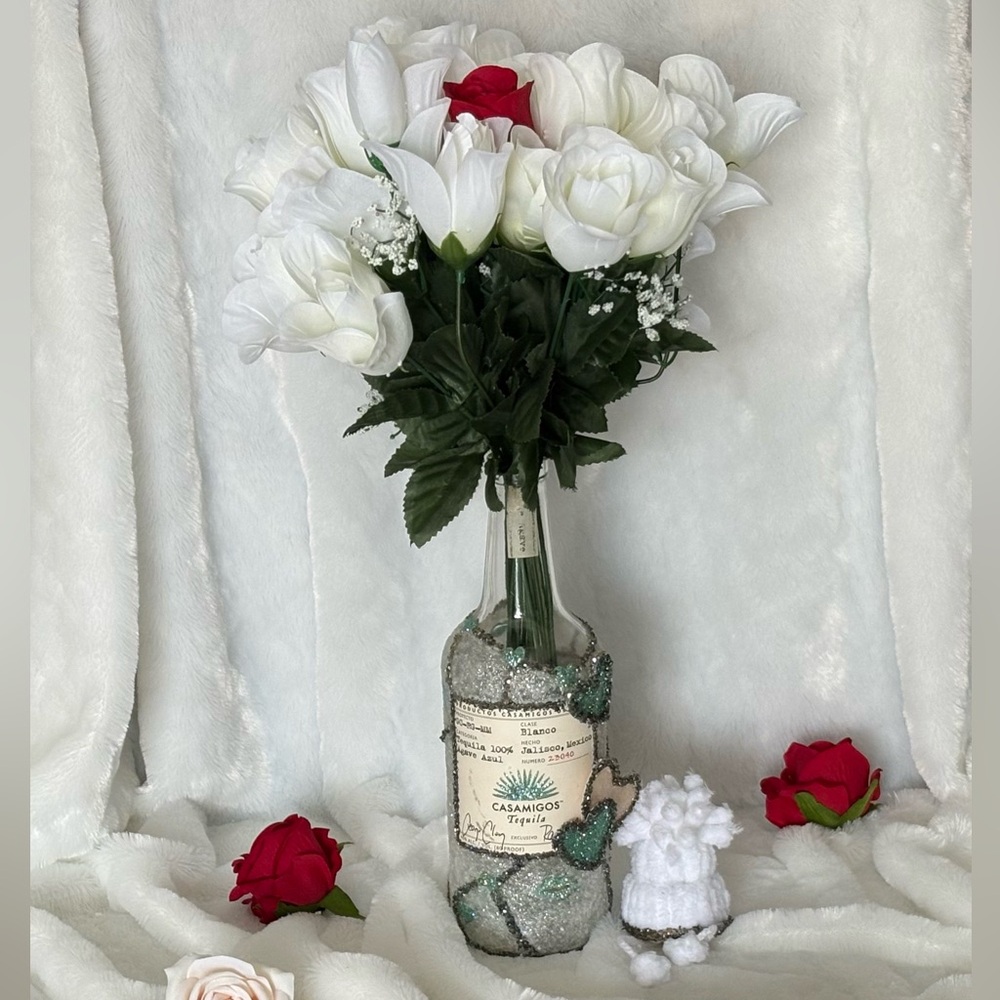 White and Red Floral Arrangement in Decorative Vase Bottle